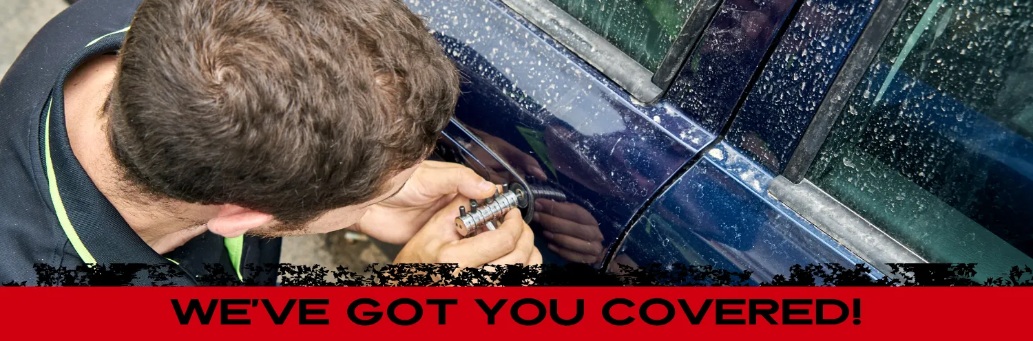 locksmith unlocking a vehicle 